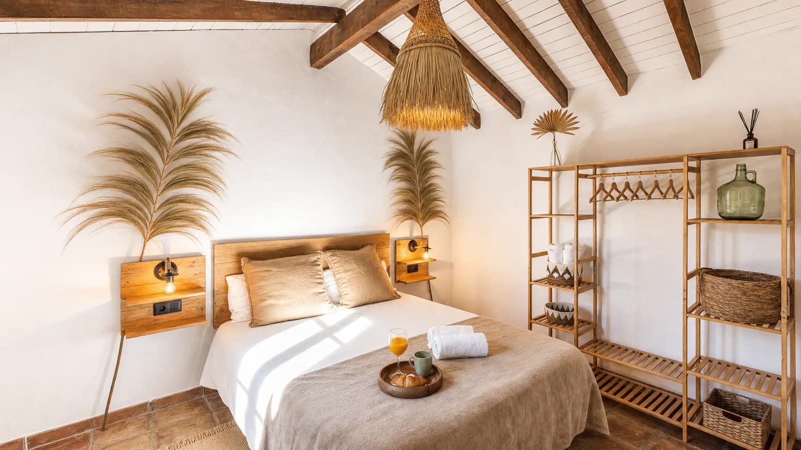 Cottage bedroom with breakfast tray on the bed