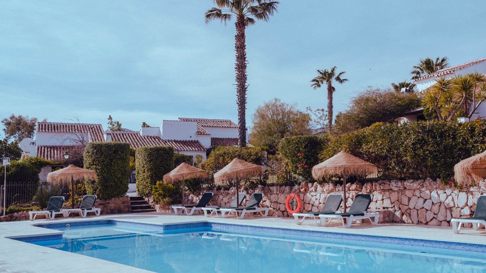 Pueblo-style cottages and pool at Finca Cantueso